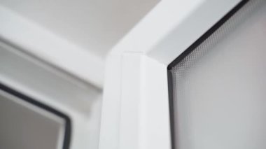 White plastic door with opaque glass close-up. Smooth camera movement. High quality FullHD footage