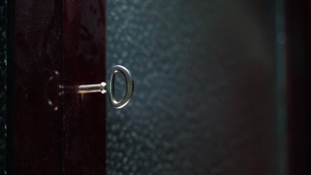 Shiny Vintage Key Inserted Sideboard Door Transparent Windows Close Blurred — Stockvideo
