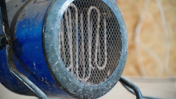 Construction Electric Fan Heater Heats Construction Site Close Blurred Background — Vídeos de Stock