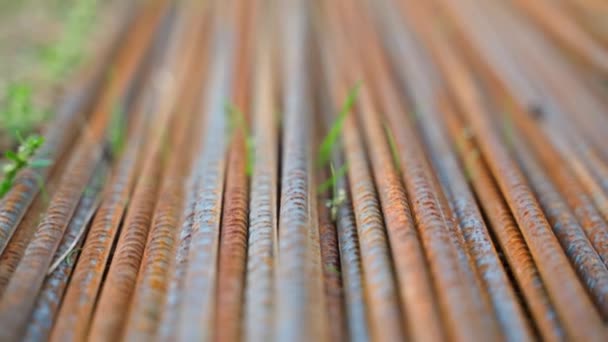 Rusty Metal Rebar Sprouted Grass Close Smooth Camera Movement Metal — Stockvideo