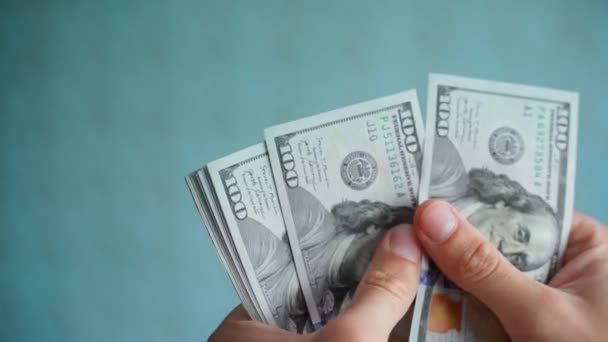 Hands Counting Dollars Close Blurred Blue Background Account Stack One — Stockvideo
