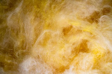 Glass wool close-up. Texture of fibrous mineral thermal insulation material