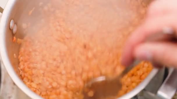 Close Orange Lentils Being Stirred Cooking Porridge Aluminum Pan High — Stock video