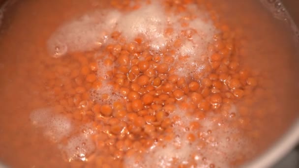 Orange Lentils Boiling Water Close High Quality Footage — Vídeo de Stock