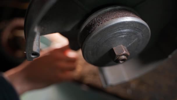 Hand Presses Start Button Grinder Abrasive Wheel Begins Rotate Foreground — Stock Video