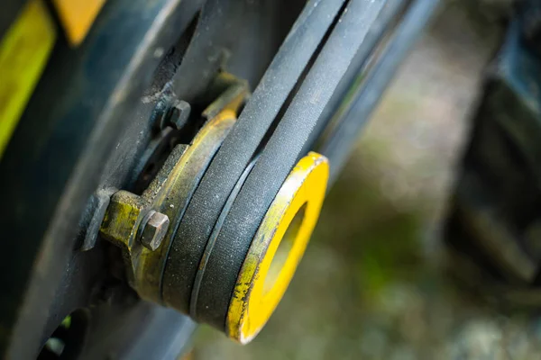 stock image Walk-behind tractor pulley with two belts close-up. Tractor for agriculture, agricultural machinery