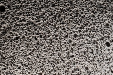 Havalandırılmış beton kaplama dokusu. Havalandırılmış beton tuğlaların soyut arkaplanı. Gaz bloğunun yapısı, inşaat temasının duvar kağıdı