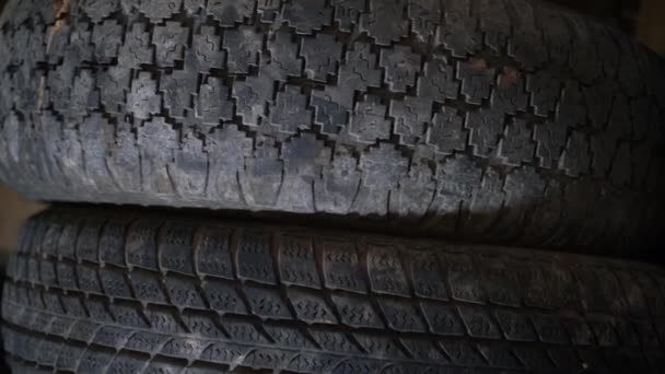 Two Old Car Tires Different Tire Patterns Difference Hard Road — Stock Video