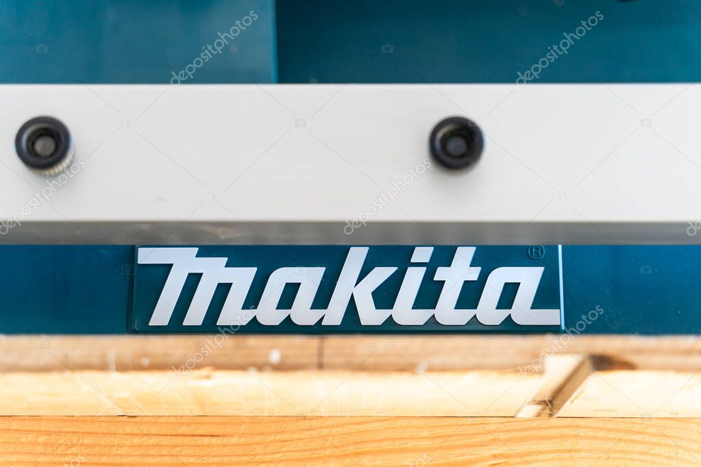 Kyiv, Ukraine - February 25, 2025: Makita logo close-up on the surface of an industrial tool.