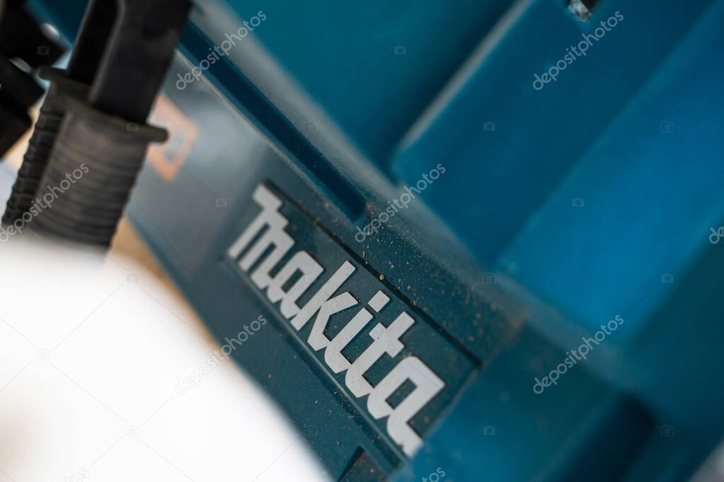 Kyiv, Ukraine - February 25, 2025: Makita logo close-up on the surface of an industrial tool.