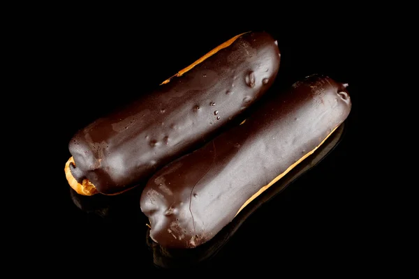 Chocolade Eclairs Zwart Isolaat Bovenaanzicht — Stockfoto