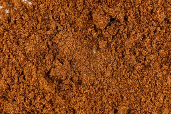 Ground nutmeg seasoning a lot close-up