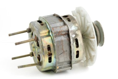 An old electric motor from a washing machine isolate
