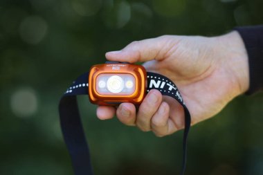 LVIV, UKRAINE - 29 Mayıs 2023: Nitecore NU31 far