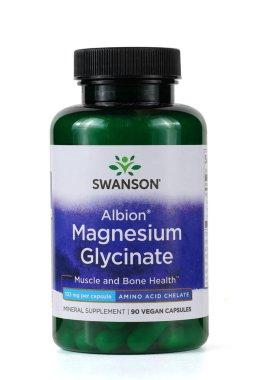 LVIV, UKRAINE - September 30, 2025: This is a green bottle containing mineral supplements labeled magnesium glycinate.