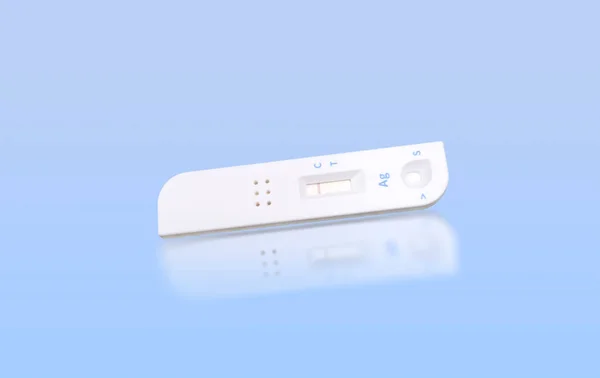 Negative antigen test of antigen test cassette isolated on blue background with reflection, Medical instrument concept.