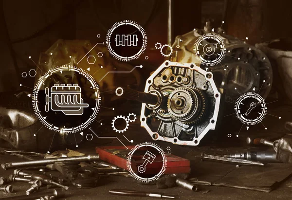 Automotive maintenance concept, gear wheel and mechanic tools in garage with maintenance icon.