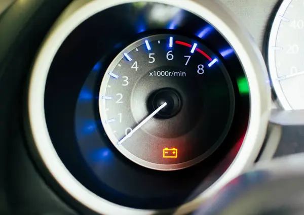 Car battery warning light on instrument panel of car, battery problem , Car maintenance concept