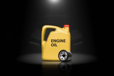 Motor oil or engine oil and oil filter in a darkness background with lights shining down from above. Car engine maintenance concept