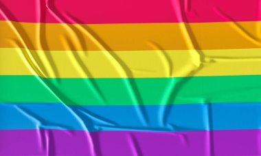 Arka planda gökkuşağı bayrağı günü. LGBT gurur ayını kutluyor.