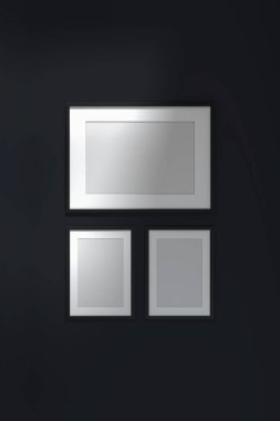 Siyah duvardaki poster çerçeveleri. 3d oluşturma.