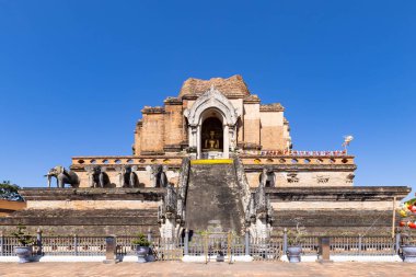Wat Chedi Luang Varavihara surrounding with color flag, a destination of tourist in Chiang Mai, Northern of Thailand