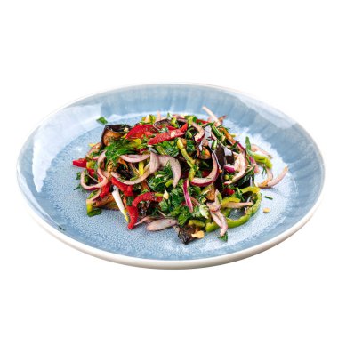Isolated portion of savory salad with aubergine and pepper