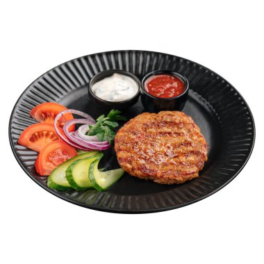 Soslu ve sebzeli tavuk pirzolası.