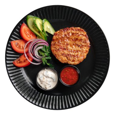 Soslu ve sebzeli tavuk pirzolası.