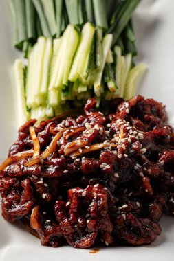 Side view on portion of chinese xinjiang duck with flatbread