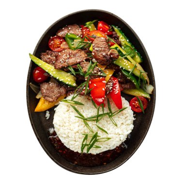 Asya usulü et, pirinç ve sebzeli.