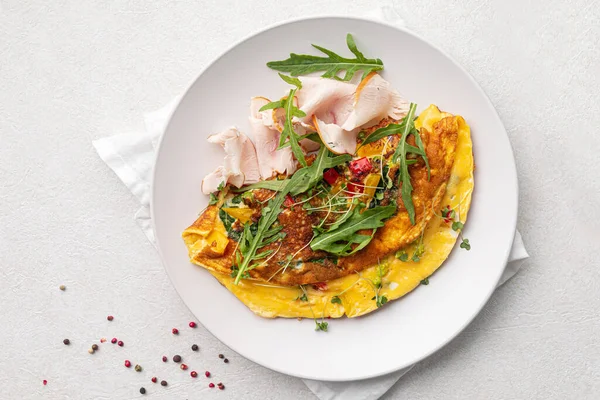 stock image Portion ofgourmet omelette breakfast with smoked chicken