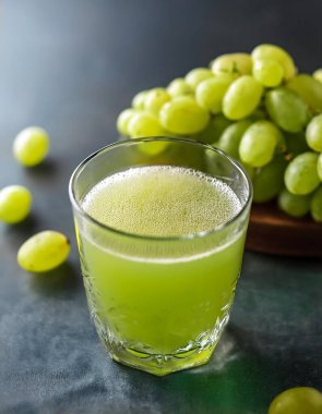 Green grape juice in a refreshing drink glass clipart