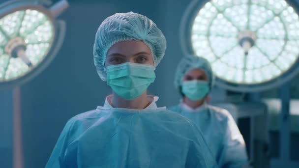 Two Beautiful Surgical Nurses Dressed Full Ready Surgery Medical Room — Vídeo de Stock