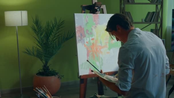 Luminous Modern Art Studio Artist Man Painting Canvas New Picture — Stock Video
