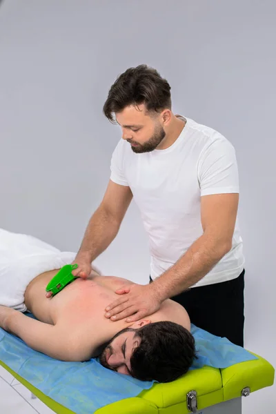 Professional Therapist Medical Clinic Doing Back Massage Muscles Special Accessories — Fotografia de Stock