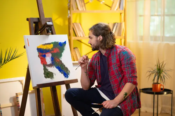 Very Good Looking Man Painting Rare Modern Painting Using His Royalty Free Stock Photos