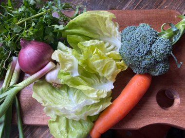 Fresh organic vegetables on cutting board