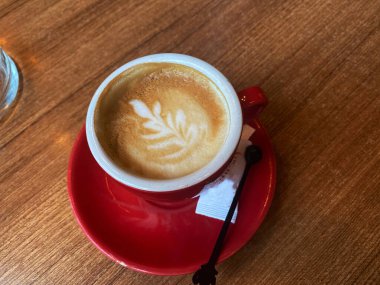 cup of coffee cappuccino in the shape of heart