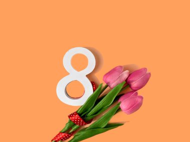 8 march 14. beautiful tulips and flowers on pink background with white tulip. international women's day