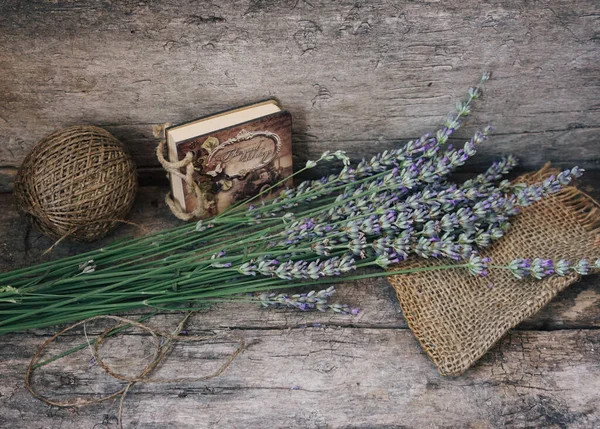 stock image bunch of lavender on a old wooden background