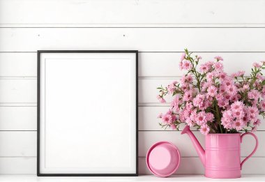 Çerçeve, çerçeve, pembe çiçekler ve beyaz arka planda boş kahve fincanı.