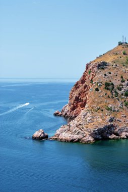 Beautiful seascape with a rocks shore. Crimea, Ukraine. clipart