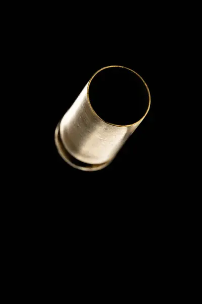 Pistol Bullet Casings Isolated Black Background Stock Picture
