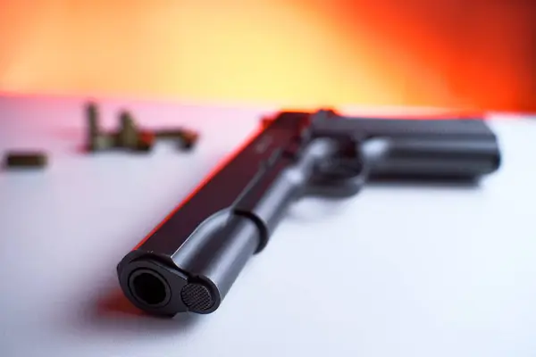 Big Black Gun Pistol White Table — Stock Photo, Image