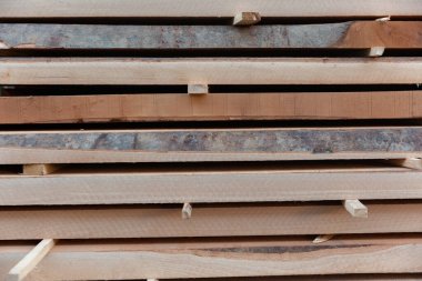 Wood processing. Joinery work. wooden furniture. Wood timber construction material for background and texture. details wood production. composition wood products.