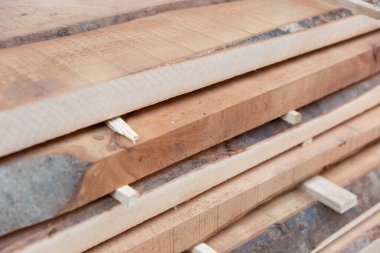 Wood processing. Joinery work. wooden furniture. Wood timber construction material for background and texture. details wood production. composition wood products.