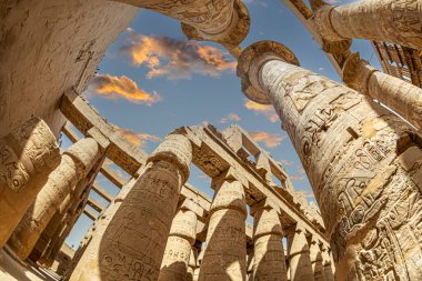 Aspects from the Karnak Temple complex, a mix of ancient egyptian temples and pylons near Luxor, Egypt. Construction began around 2000-1700 BCE up to 30530 BCE. God is Amun-Ra. World Heritage Site.