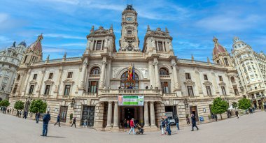 VALENCIA, SPAIN - MARCH 28, 2022: The Town Hall of the city, seat of the Municipal Council, integrates two buildings: House of Education, built 1758-1763, and the body of building built in 1930. clipart
