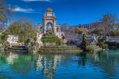 BARCELONA, SPAIN - FEB. 27, 2022: The waterfall building of the Ciudadela Park, known as Gran Cascada or Monumental Waterfall, located in the Ciudadela Park, Old Town. It was built 1875-1888.